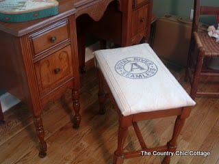 thrift store grain sack on a stool seat