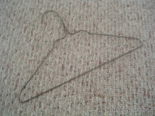 Coat hanger on beige carpet