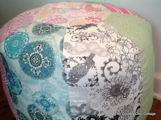 side view of a patchwork fabric floor pouf