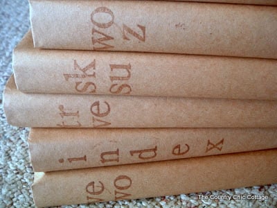 covered books with stamped spines
