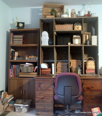 wooden crate hutch on top of wooden desk with burgundy office chair