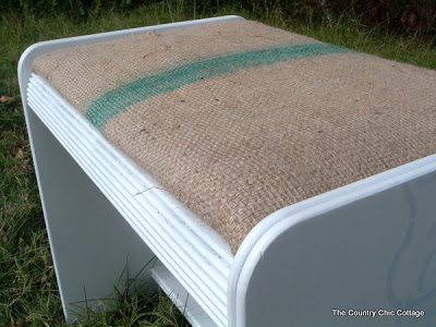 close up of finished coffee sack stool with stencil