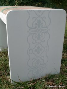 side of coffee sack stool with stencil