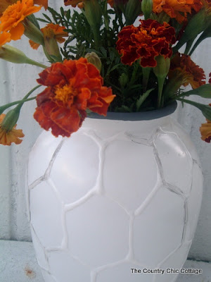 white hive painted vases
