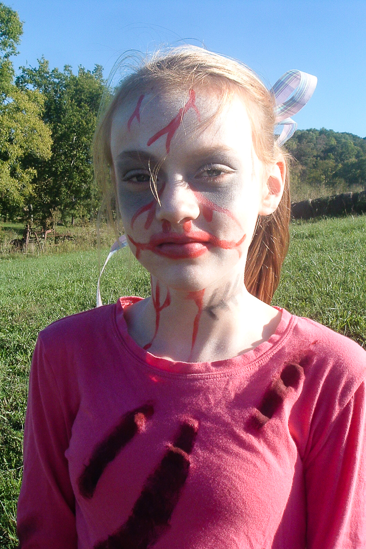 Teen girl in costume zombi. Concept of death on Halloween party