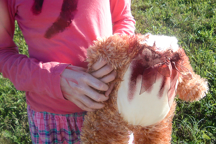 Teen girl zombie costume for Halloween, and a zombie teddy beat!