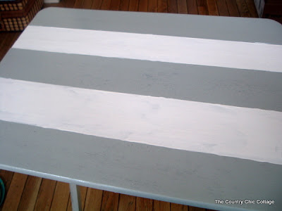 painted grey and white striped table