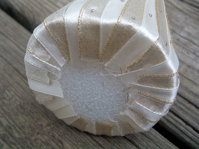 bottom of styrofoam cone with ribbon nailed