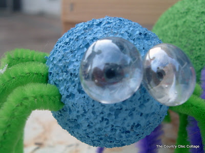 blue spider craft with glass eyes