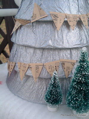 stacked styrofoam tree with sheet music bunting