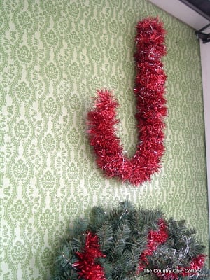 j made out of red tinsel