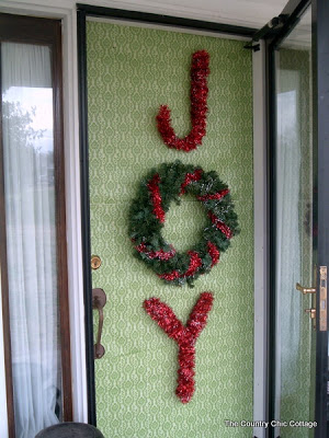 joy letters on a front door