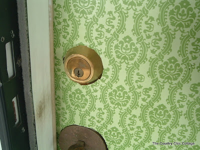 green wrapping paper on front door