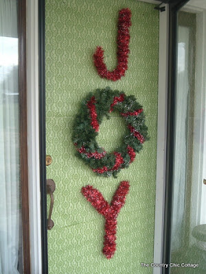 joy letters on a front door
