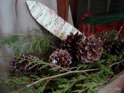 paper feathers on greenery