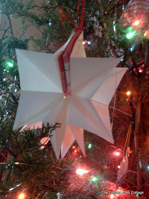 white paper ornaments on a tree
