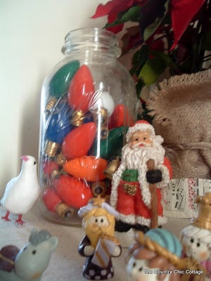 large mason jar filled with vintage Christmas lights