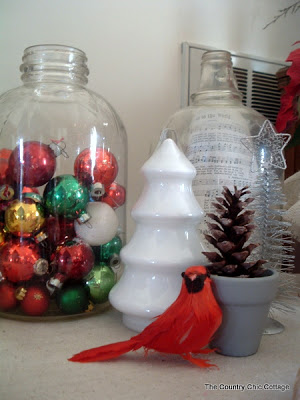 white ceramic christmas tree, large mason jar filled with ornaments