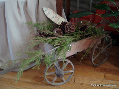 vintage wooden wagon with pine clippings