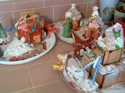collection of gingerbread houses on beige tile
