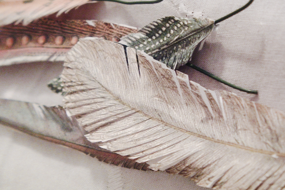 print feather images then cut to make them look real