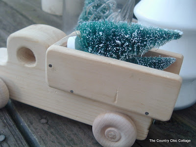 Toy dump truck with trees