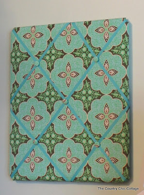 green and aqua fabric covered memo board