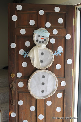 snowman art on a wooden door