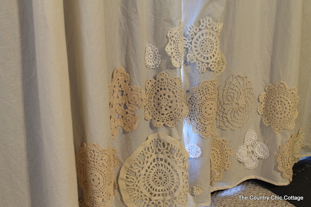 close up of doilies on curtains