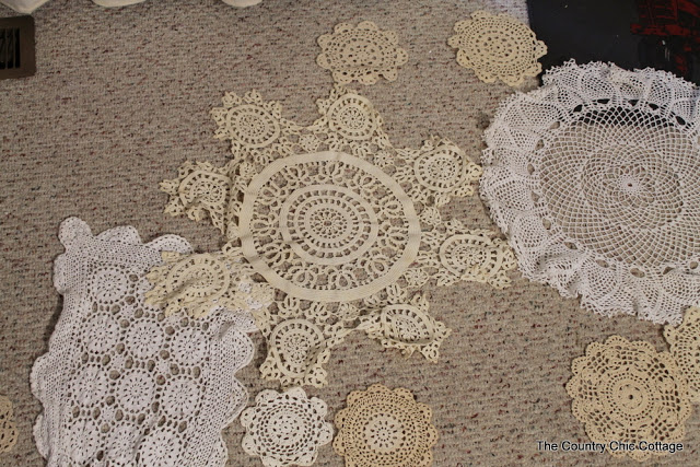 assortment of doilies on carpet