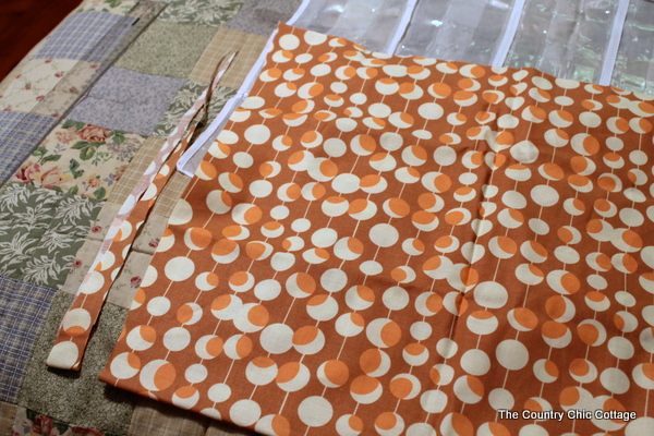 Fabric scut for wrapping paper organizer