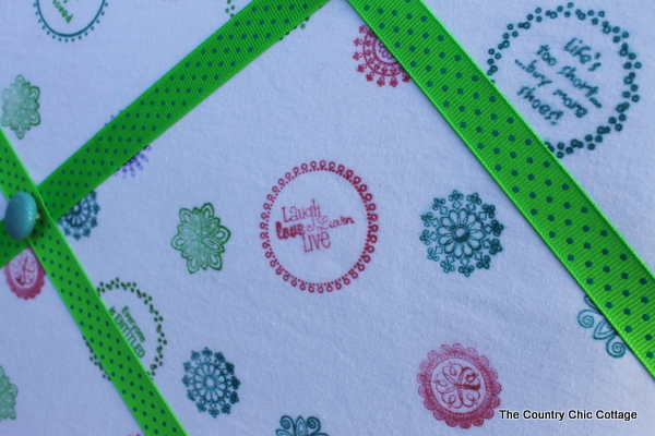 stamped fabric with green ribbon 