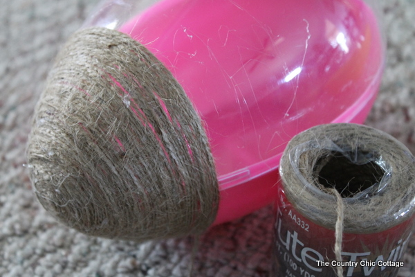 wrapping easter egg in jute twine