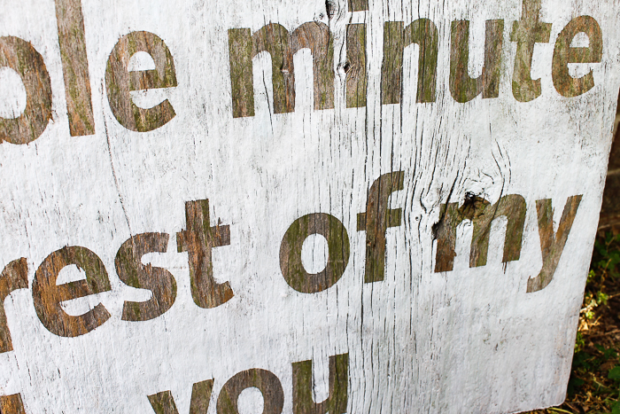 using a Cricut to add a quote to a barn wood sign