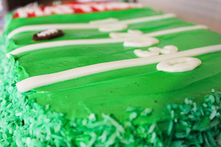 green coconut on a football cake