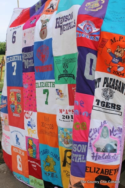 memory quilt hanging up outside