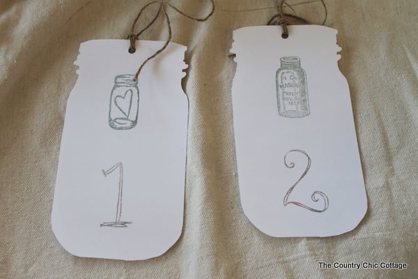 mason jar tags for wedding reception table numbers