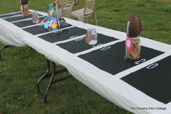 Sports party football centerpiece and football field table runner.