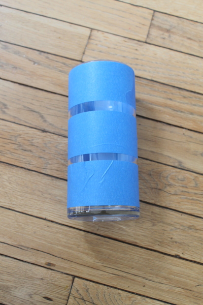 marking off a glass vase with masking tape