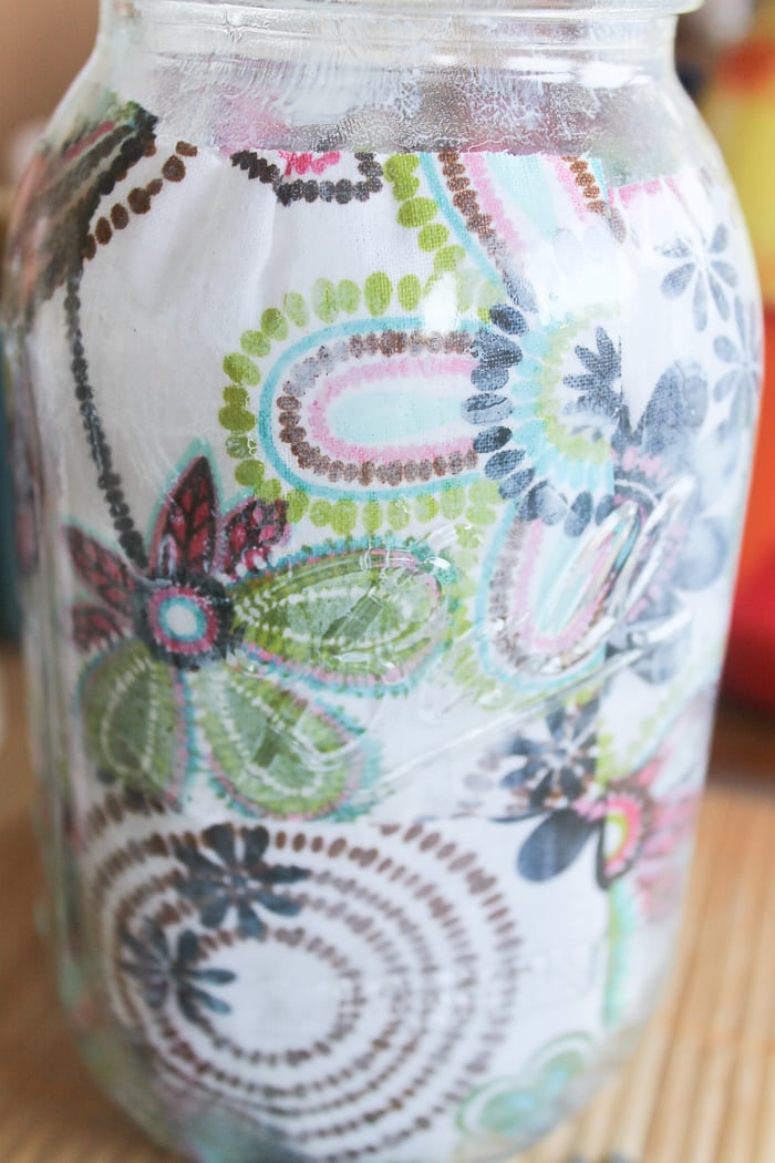 I only needed a few squares of floral fabric to decoupage the inside of this mason jar