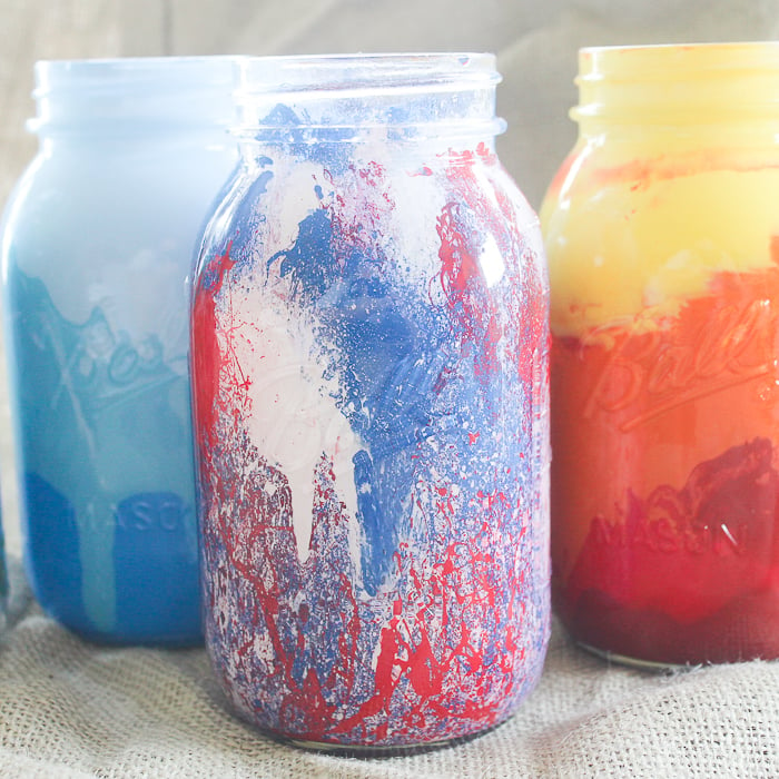 My blue ombre, patriotic splatter, and sunset painted mason jars