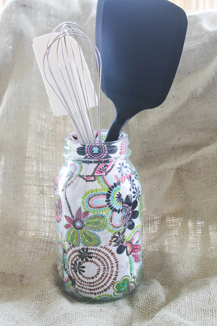 This groovy floral patterned fabric is decoupaged on the inside of the mason jar