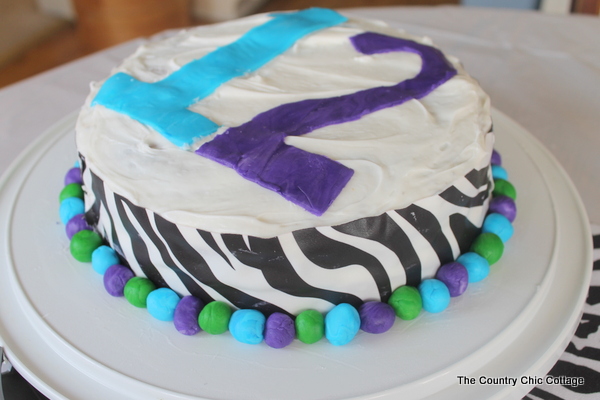 12th birthday cake with zebra and blue and purple