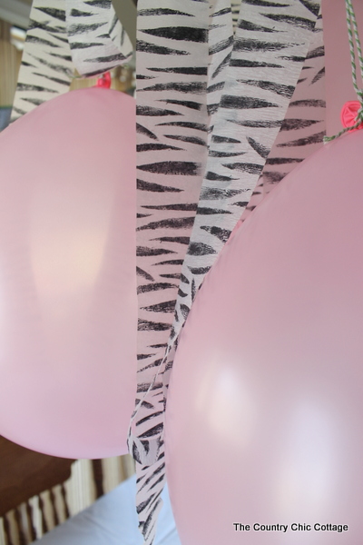 close up of hanging zebra party centerpiece