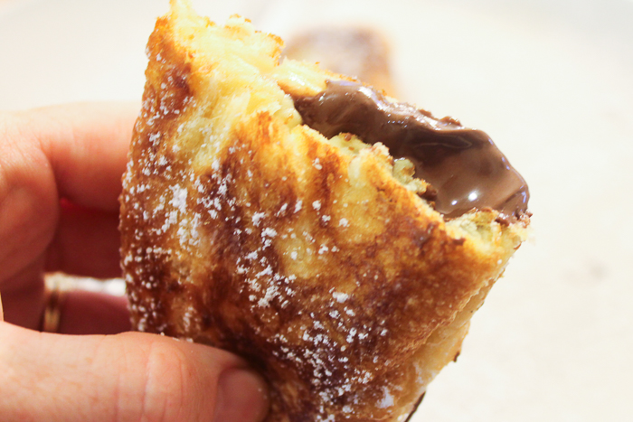 A half eaten Nutella fried pie