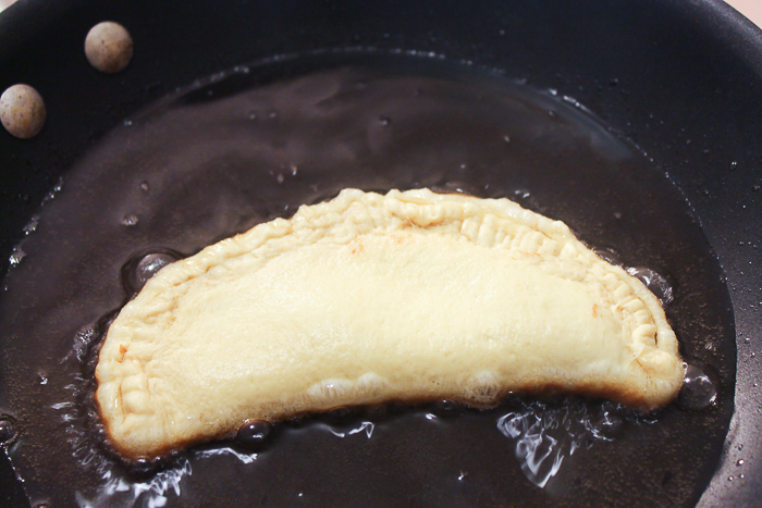 Making fried pies with Nutella.