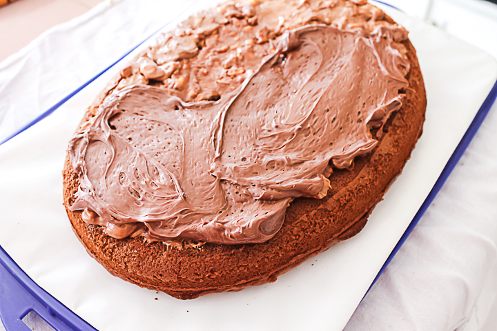 icing a snickers cake