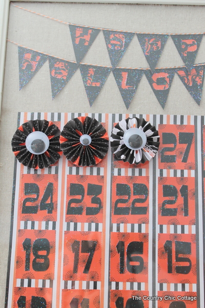 adding paper pinwheels to countdown to Halloween
