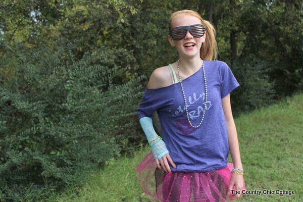 Here's how to to diy a fun 80s girl Halloween costume with items you can find at the Dollar store!