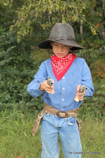 This cool cowboy is ready for Halloween in his thrift store cowboy halloween costume